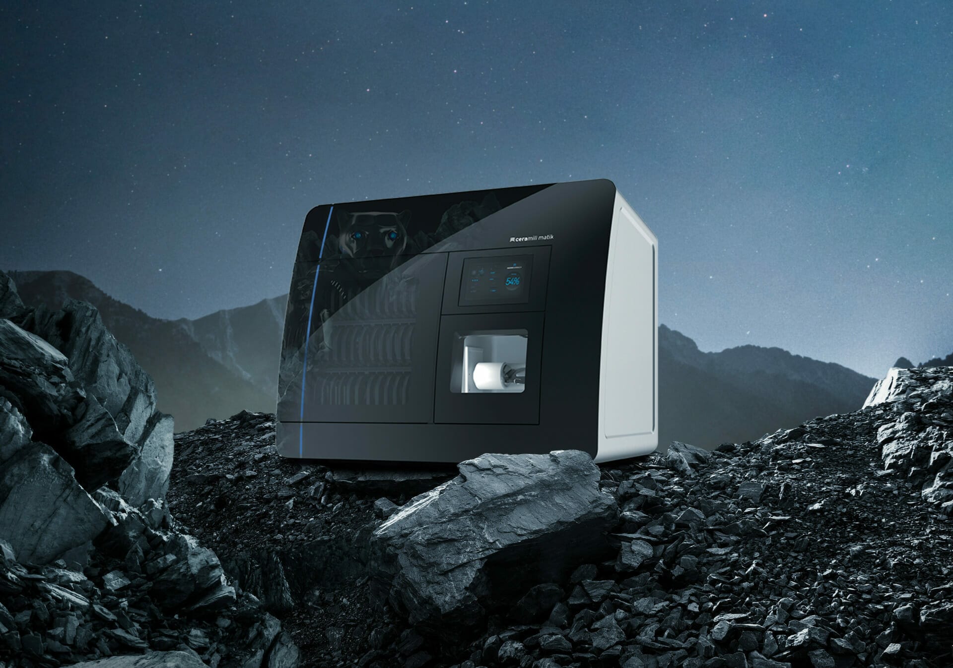 A sleek, modern electronic device is placed on a rocky, mountainous terrain under a starry night sky, capturing the pioneering spirit of every new Spryker customer.