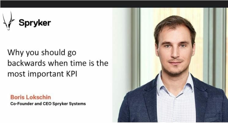 A man in business attire stands next to text that reads: "Spryker. Why you should go backwards when time is the most important KPI." Below is the name Boris Lokschin, Co-Founder and CEO Spryker Systems.