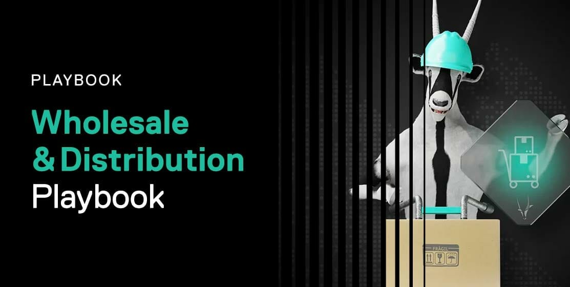 Cover of the "Wholesale & Distribution Playbook" featuring a goat wearing a hard hat, holding a package, with black background and green text. Perfect for those in the wholesale & distribution industry looking for insightful resources.