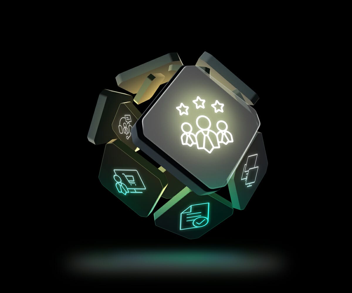 A 3D icon cube featuring various symbols including a group of people with stars above them, a folder, briefcase, and other business-related icons, perfect for illustrating b2b ecommerce concepts. The background is black.