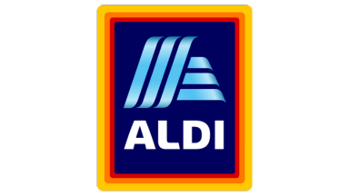 The image shows the logo of the supermarket chain ALDI. It features the word "ALDI" in bold white letters beneath stylized, blue, triangular lines on a dark blue background, with a multicolored border in shades of yellow, orange, and red.