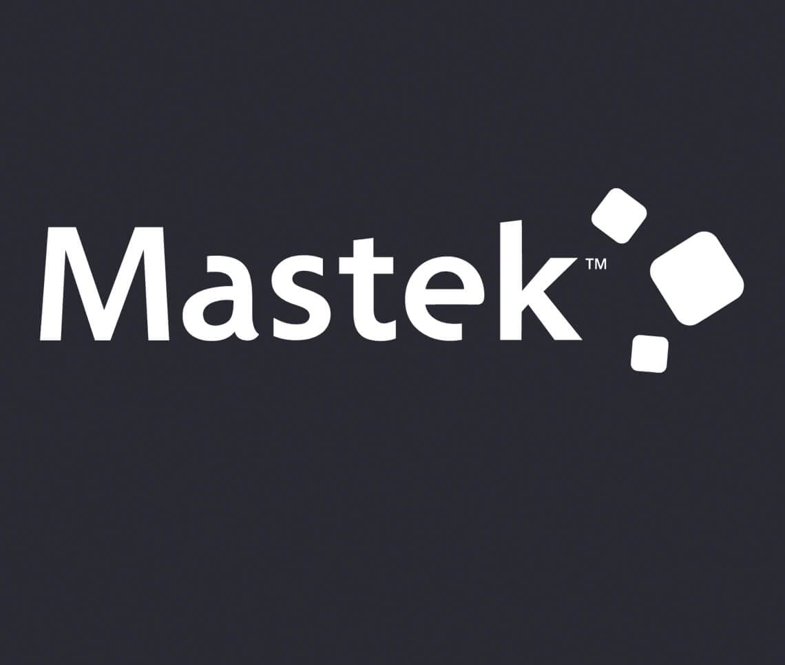 Text reads "Mastek" with small geometric shapes resembling accelerators to the right on a dark background.