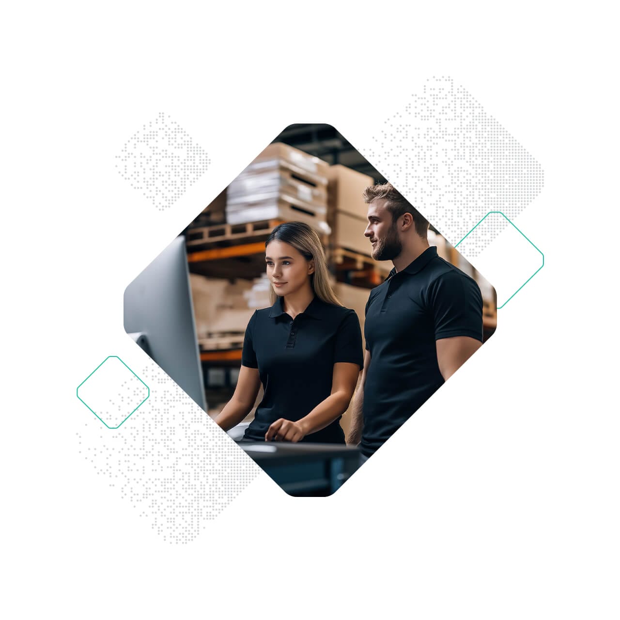 Two warehouse workers in black uniforms look at a computer monitor in an industrial storage area with shelves and boxes, discussing optibelt inventory management.